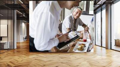 Friends having breakfast at a hotel Wall mural