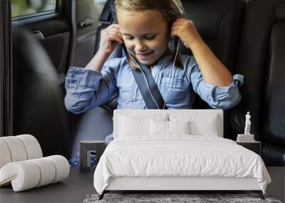 Girl listening to music in the car Wall mural