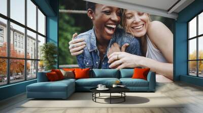 girlfriends having a great time together Wall mural