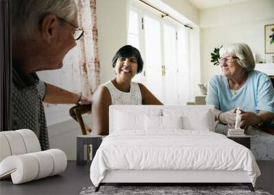 Group of diverse senior people using mobile phone Wall mural