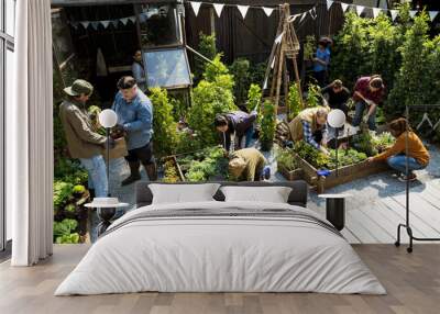 Group of people planting vegetable in greenhouse Wall mural