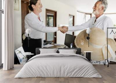 Guests checking in to a hotel Wall mural