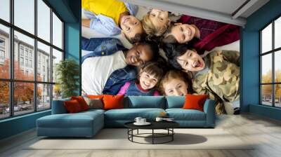 Happiness group of cute and adorable children lay down together Wall mural