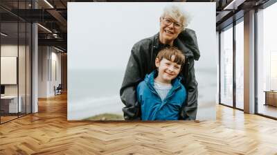 Happy boy with this grandmother Wall mural