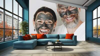 Happy couple wearing a charcoal mask Wall mural