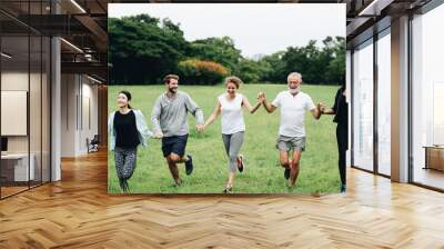 happy diverse people enjoying in the park Wall mural