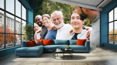 Happy diverse people together in the park Wall mural