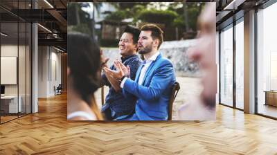 Happy guests at a beach wedding Wall mural