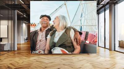 Happy senior couple on a Ferris wheel Wall mural