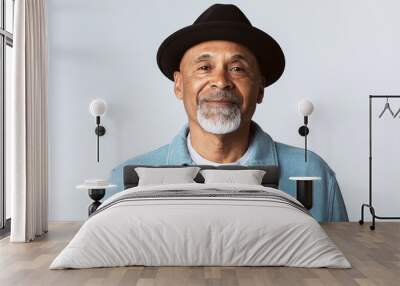 Happy senior man wearing a black hat Wall mural