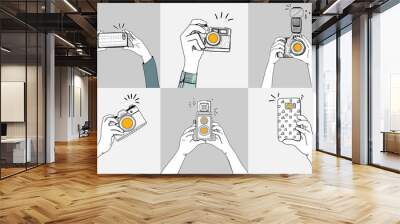 illustration of hand holding digital device Wall mural