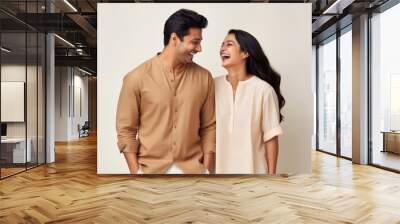 Indian couple cheerful laughing adult. Wall mural