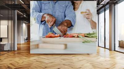 Mature couple in the kitchen Wall mural