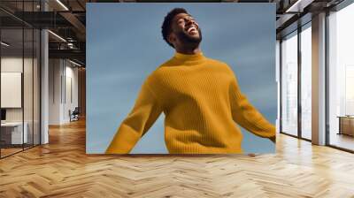 Men's yellow sweaters, winter fashion Wall mural