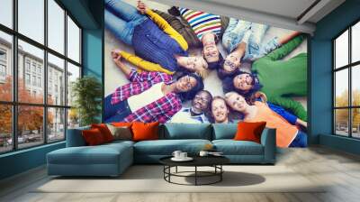 Multiethnic People Holding Hands and Lying Down Wall mural