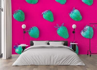 Neon green strawberries on pink patterned background Wall mural