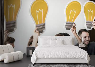 Peopl with lightbulb icon Wall mural