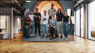 Portrait of a shoot production team Wall mural