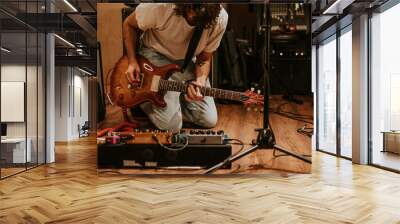 Rock band guitarist performing repetition in recording studio Wall mural