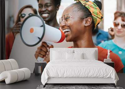 Smiling demonstrator with megaphone Wall mural