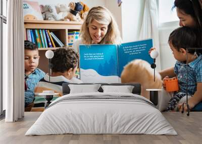 Teacher and students reading a Christmas story together Wall mural