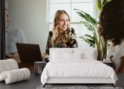 Woman in a creative meeting Wall mural