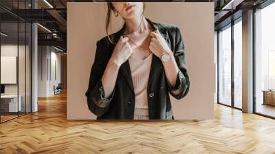 Woman wearing a black blazer Wall mural