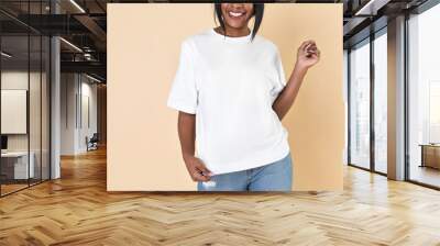 Woman wearing a blank white t-shirt and jeans Wall mural