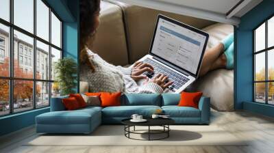 woman working on a laptop Wall mural