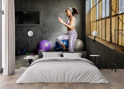 Working out with balance balls Wall mural