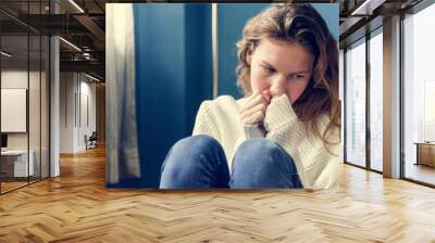 Young alone girl feeling sad Wall mural