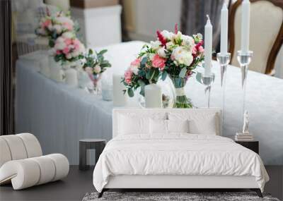 wedding mirror table with flowers and candles close to Wall mural