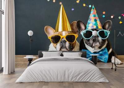 celebration birthday sylvester new year s eve party funny animal banner greeting card bulldog dog with party hat outfit sunglasses suit and bow tie isolated on black table background Wall mural