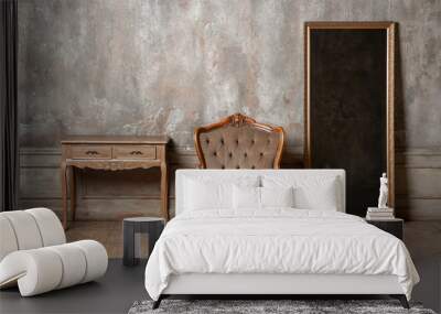 An old chair, a mirror and a table on background of vintage wall Wall mural