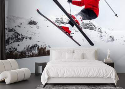 Little skier jumping in the snow. Wall mural