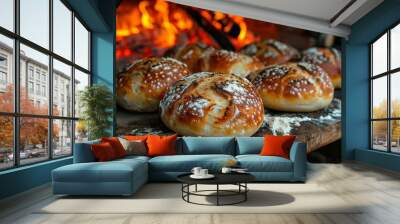 Artisan bread baking in a traditional wood-fired oven. Wall mural