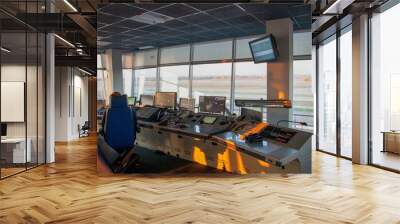 The workplace of the flight dispatcher in the airport. Flight control tower. Aviation background. Air Traffic Manager. Armchair and remote control with screen. Air Traffic Controller room. Wall mural