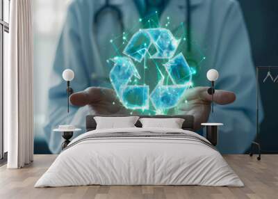 A glowing, holographic recycling sign is cradled in the hands of a person in a white lab coat, suggesting a medical professional or a high-tech healthcare concept. Wall mural