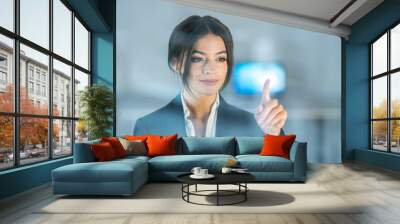 The businesswoman touch the virtual screen Wall mural