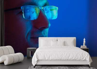 the portrait of the happy businessman in glasses Wall mural