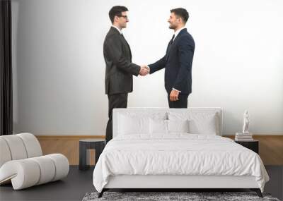 The two businessmen handshake on the white wall background Wall mural