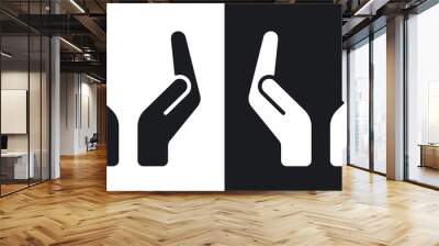 Vector two protecting hands icon. Two-tone version on black and white background Wall mural