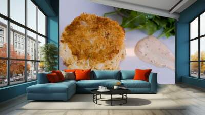 Crab cake. Crab served with spicy rémoulade sauce on top of a mixed green salad. Jumbo crab meat mixed with garlic, onions, spices & fried in butter. Classic American restaurant appetizer. Wall mural