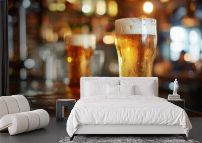 A bucket filled with cold beers rests on a bar counter, highlighting the lively atmosphere of the pub in the background Wall mural