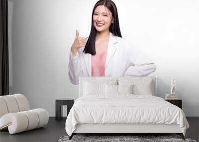 Portrait happy Asian woman shows thumb up and looking at the camera on transparent background, PNG file format. Wall mural