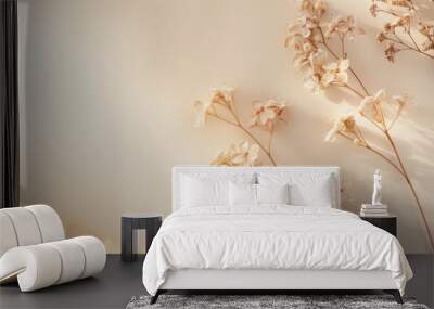 A simple flat lay featuring white flowers arranged on a beige background with ample copy space. Soft natural light creates a warm, inviting atmosphere Wall mural