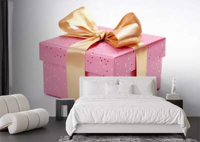 Christmas gift with a golden bow, festive background  Wall mural