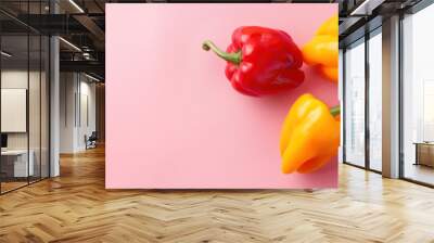 Three   peppers on pink background Wall mural