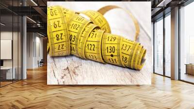 Weight loss concept - website banner of a measuring tape with copy space Wall mural