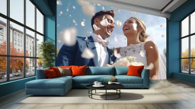 Happy bride at wedding ceremony and people sprinkling flower petals Wall mural